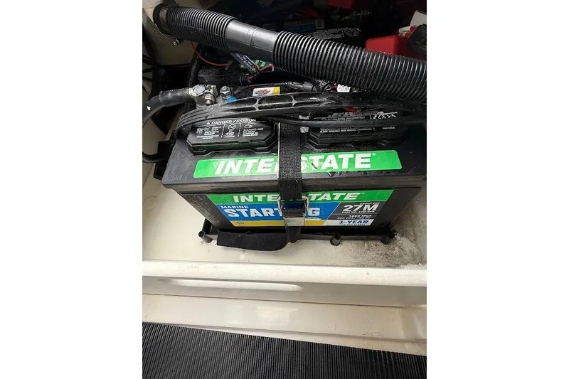 Slide: The Image of Interstate marine battery in 2023 Sea Ray SPX 230 boat engine compartment. - 33