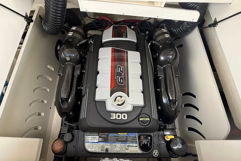 Slide: The Image of Engine compartment of 2023 Sea Ray SPX 230 boat, featuring a powerful 6.2L engine. - 35