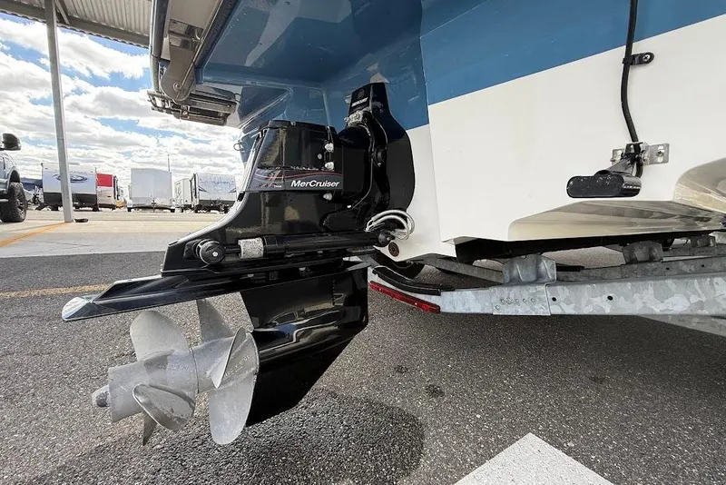 Slide: The Image of 2023 Sea Ray SPX 230 boat with MerCruiser engine, displayed on a trailer. - 4