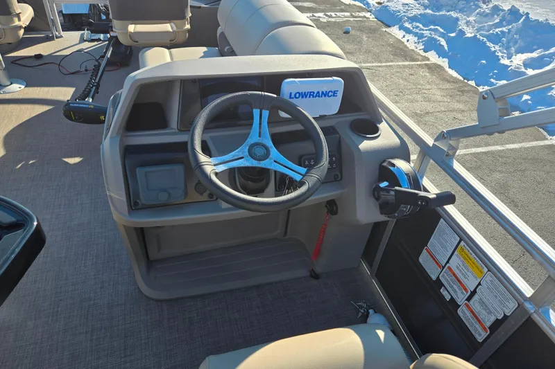 Slide: The Image of 2024 Sun Tracker Fishin' Barge 20 DLX steering console with Lowrance electronics. - 19