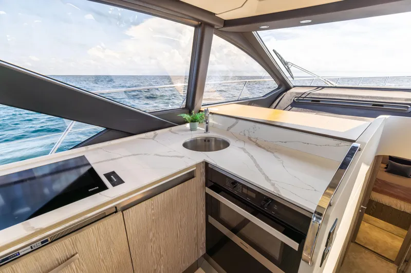Slide: The Image of Luxurious 2021 Azimut S6 yacht kitchen with modern appliances and elegant design. - 20