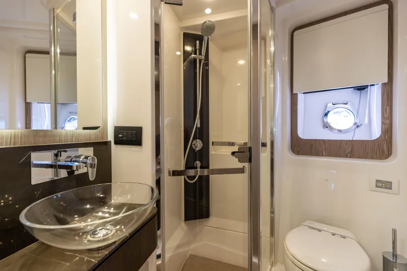Slide: The Image of Luxurious bedroom interior of 2021 Azimut S6 yacht with modern design and elegant furnishings. - 30
