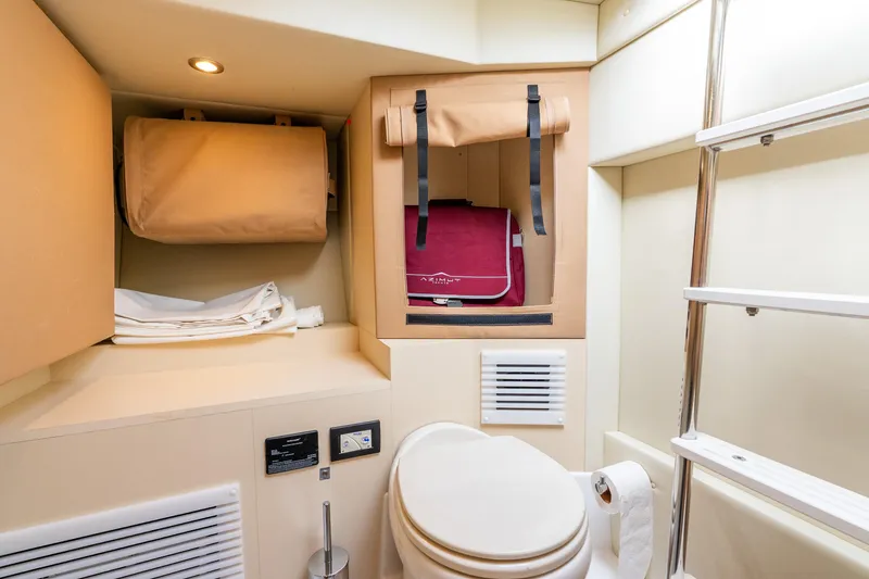 Slide: The Image of 2021 Azimut S6 yacht bathroom with storage, ladder, and modern fixtures. - 43