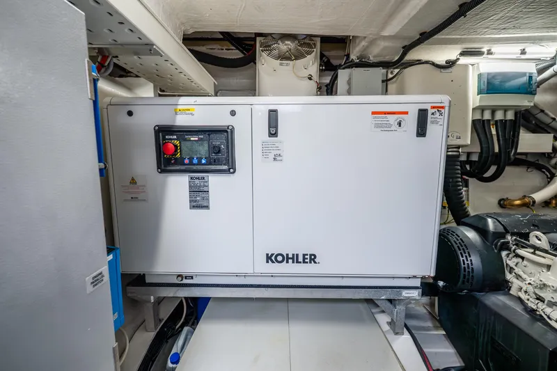 Slide: The Image of Engine room of 2021 Azimut S6 yacht featuring a Kohler generator. - 46