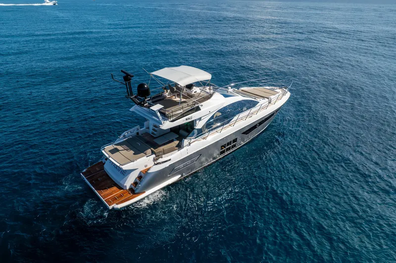 Slide: The Image of Luxurious 2021 Azimut S6 yacht deck with ocean view and modern seating area. - 5