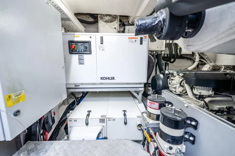 Slide: The Image of Engine room of 2021 Azimut S6 yacht featuring Kohler generator and mechanical components. - 51