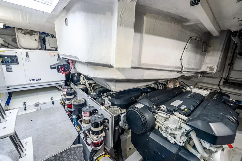 Slide: The Image of Engine room of 2021 Azimut S6 yacht featuring Kohler generator and advanced machinery. - 52