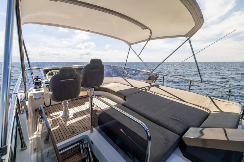 Slide: The Image of Luxurious 2021 Azimut S6 yacht deck with modern seating and ocean view. - 8