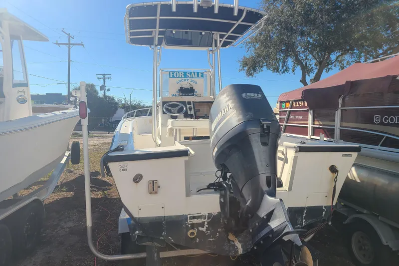 Slide: The Image of 1995 Mako 201 Center Console boat with Yamaha outboard motor for sale. - 2
