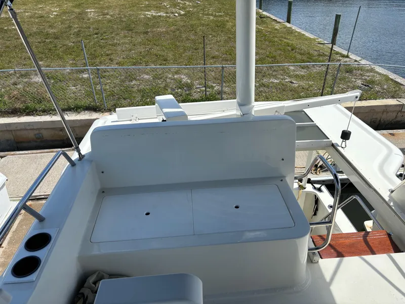 Slide: The Image of 2004 Sabreline 36 Sedan boat, deck view at dock. - 11