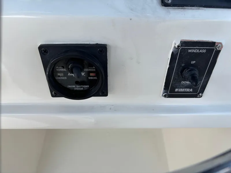 Slide: The Image of Control panel of 2004 Sabreline 36 Sedan with switches. - 17