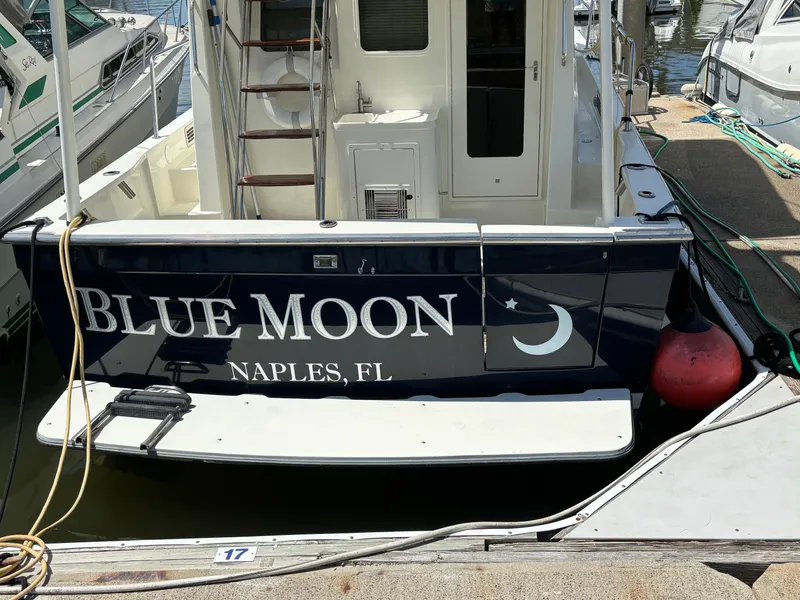 Slide: The Image of Rear view of Sabreline 36 Sedan yacht "Blue Moon" in Naples, FL. - 2