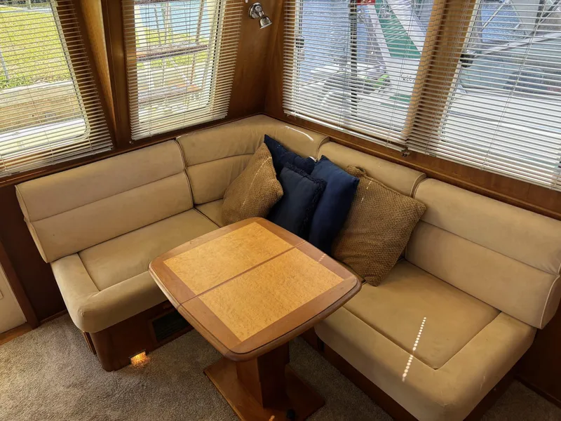 Slide: The Image of Interior of 2004 Sabreline 36 Sedan with cozy seating area. - 39