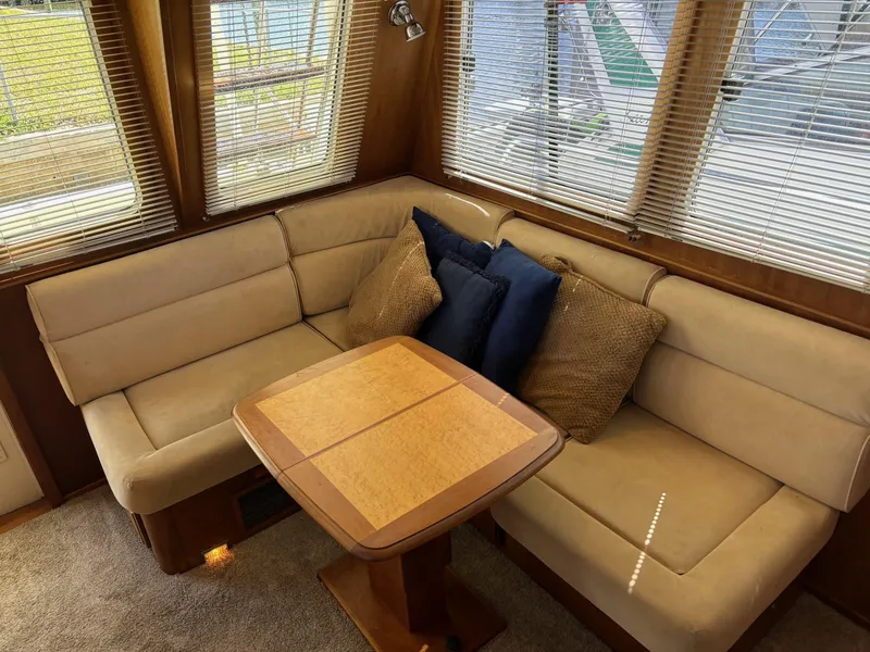 Slide: The Image of Interior of 2004 Sabreline 36 Sedan with cozy seating area. - 40