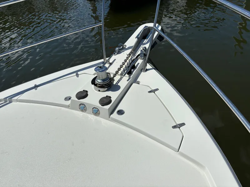 Slide: The Image of Bow of 2004 Sabreline 36 Sedan with anchor windlass. - 6