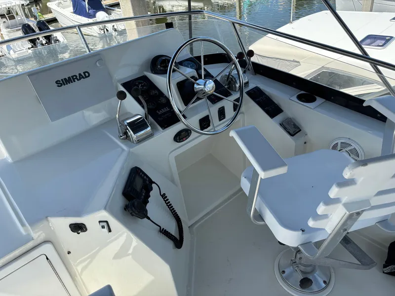 Slide: The Image of 2004 Sabreline 36 Sedan helm with Simrad equipment. - 7