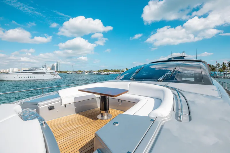 Slide: The Image of Luxurious 2014 Riva 86' DOMINO yacht with sleek design and spacious deck seating. - 14