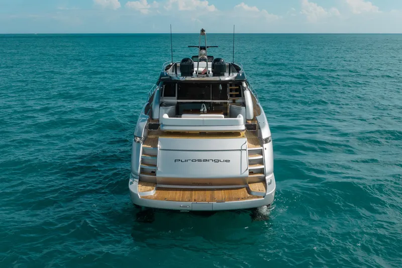 Slide: The Image of Luxury 2014 Riva 86' DOMINO yacht on open sea, rear view. - 2