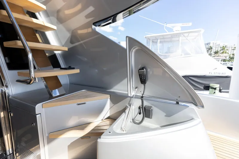 Slide: The Image of Interior of 2014 Riva 86' DOMINO yacht with modern staircase and communication equipment. - 20