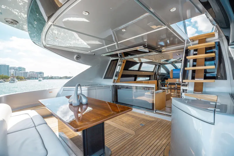 Slide: The Image of Luxurious 2014 Riva 86' DOMINO yacht interior with sleek design and waterfront view. - 22