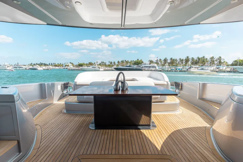 Slide: The Image of Luxurious 2014 Riva 86' DOMINO yacht deck with ocean view and elegant seating. - 23