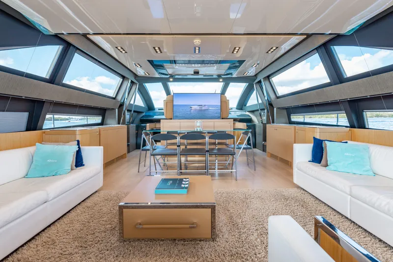 Slide: The Image of Luxurious interior of 2014 Riva 86' DOMINO yacht with modern furnishings and panoramic windows. - 24