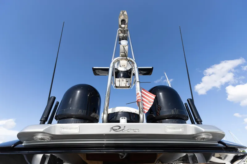 Slide: The Image of Riva 86' DOMINO yacht, 2014 model, with radar and antennas against blue sky. - 28