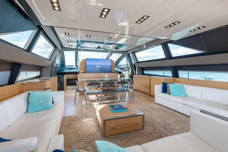 Slide: The Image of Luxurious interior of 2014 Riva 86' DOMINO yacht with modern furnishings and panoramic windows. - 30