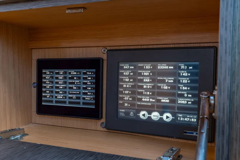 Slide: The Image of Control panel of 2014 Riva 86' DOMINO yacht displaying engine and navigation data. - 38