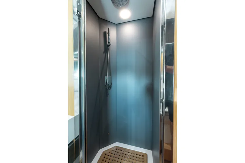 Slide: The Image of Shower area in 2014 Riva 86' DOMINO yacht with modern fixtures and lighting. - 42
