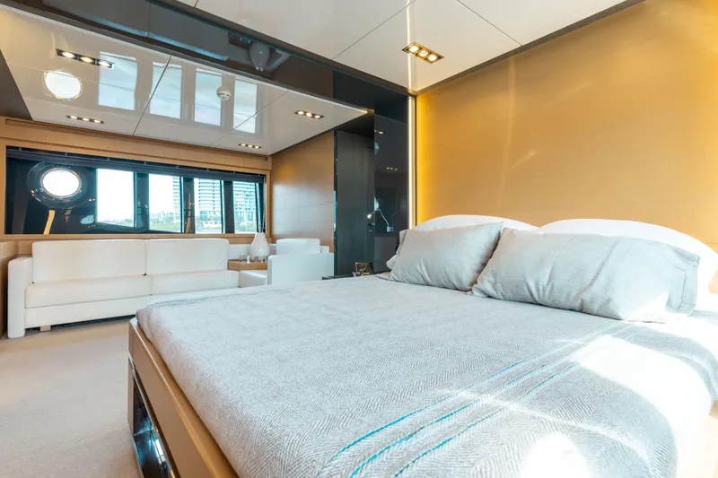 Slide: The Image of Luxurious bedroom interior on 2014 Riva 86' DOMINO yacht with modern design and large windows. - 50