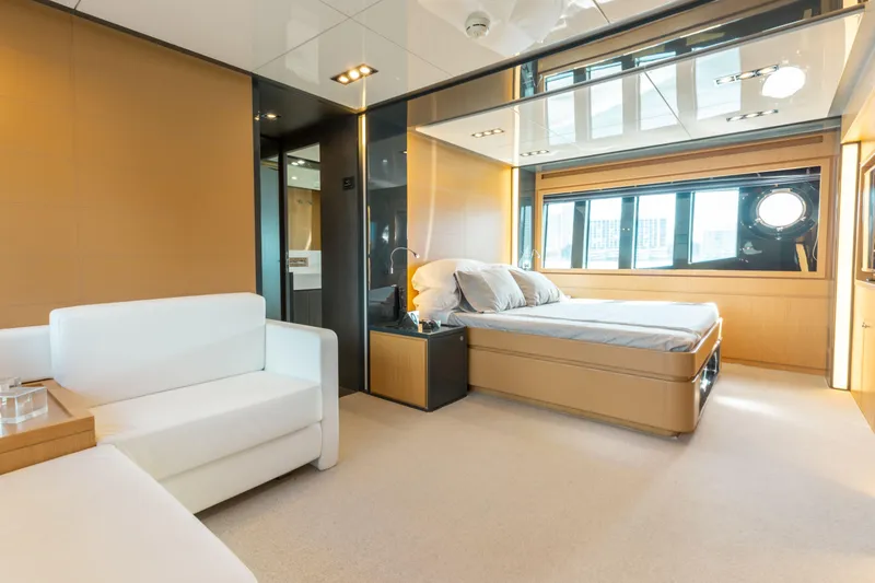 Slide: The Image of Luxurious bedroom interior of 2014 Riva 86' DOMINO yacht with modern design and large windows. - 52