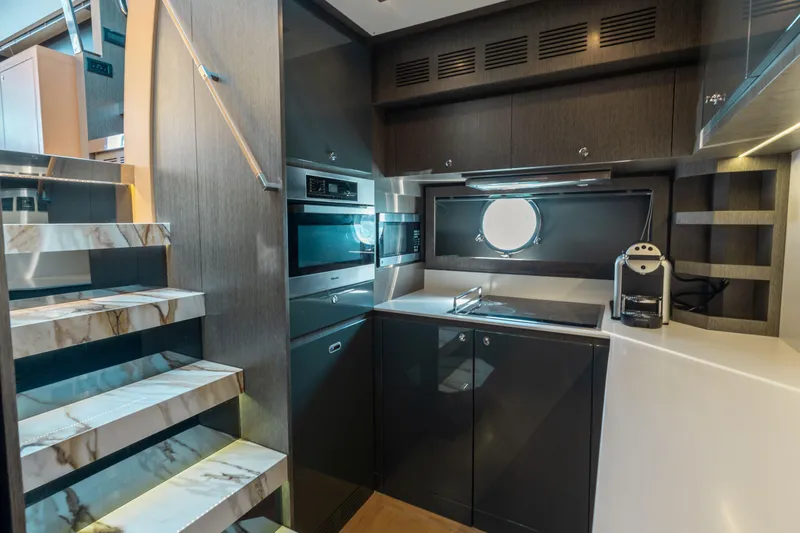 Slide: The Image of Luxurious kitchen interior of 2014 Riva 86' DOMINO yacht with modern appliances. - 56