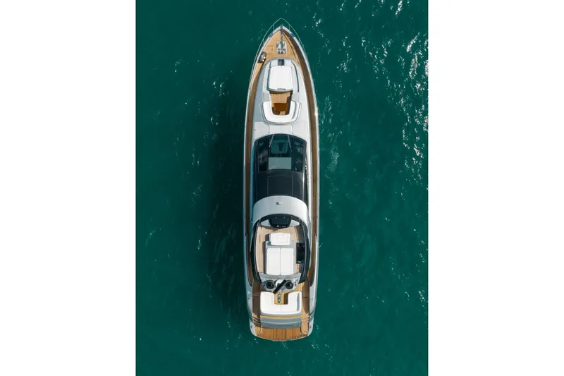 Slide: The Image of Overhead view of 2014 Riva 86' DOMINO yacht on turquoise water. - 6