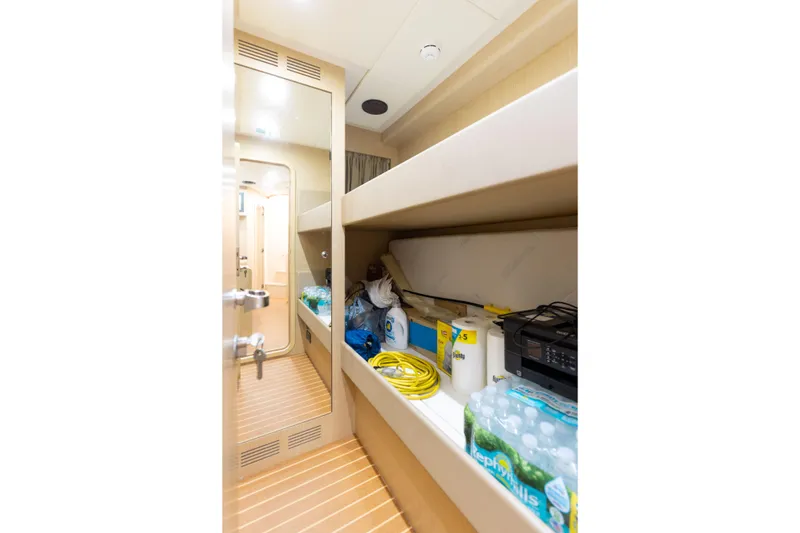 Slide: The Image of Storage area inside 2014 Riva 86' DOMINO yacht with supplies and equipment. - 65