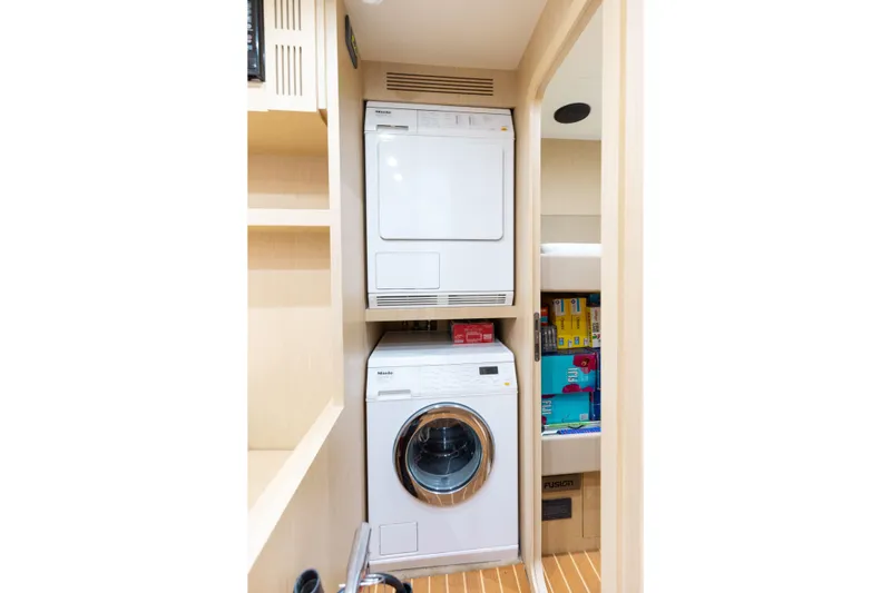 Slide: The Image of Laundry area with washer and dryer on 2014 Riva 86' DOMINO yacht. - 66