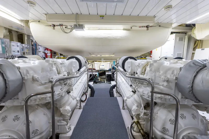 Slide: The Image of Engine room of 2014 Riva 86' DOMINO yacht, featuring dual engines and modern equipment. - 67