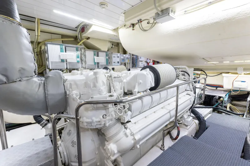 Slide: The Image of Engine room of 2014 Riva 86' DOMINO yacht, showcasing advanced machinery and equipment. - 69
