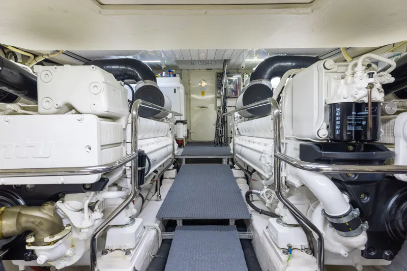 Slide: The Image of Engine room of 2014 Riva 86' DOMINO yacht, featuring dual MTU engines. - 70
