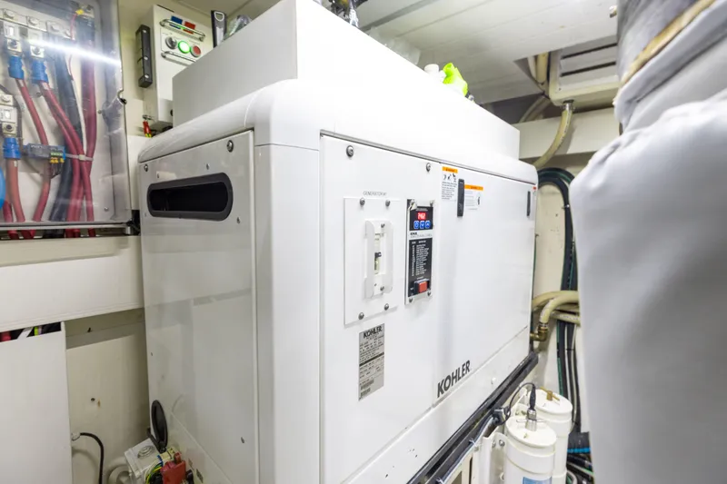 Slide: The Image of Engine room of 2014 Riva 86' DOMINO yacht featuring Kohler generator. - 71