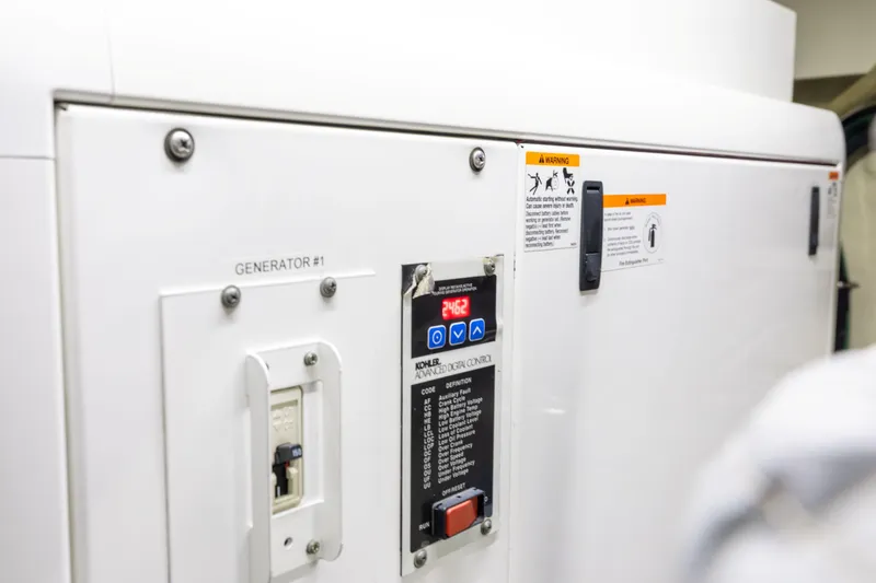Slide: The Image of Control panel of a generator on a 2014 Riva 86' DOMINO yacht. - 72