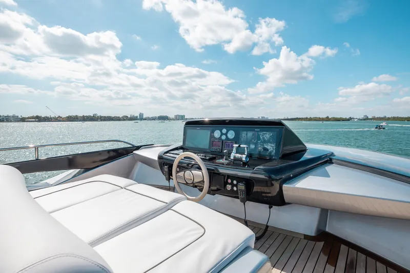 Slide: The Image of Luxurious 2014 Riva 86' DOMINO yacht helm with ocean view and modern controls. - 9