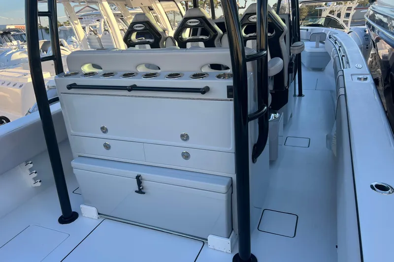 Slide: The Image of 2026 Contender 39 ST boat interior with seating and storage compartments. - 11