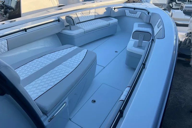 Slide: The Image of 2026 Contender 39 ST boat interior with luxurious seating and modern design. - 15
