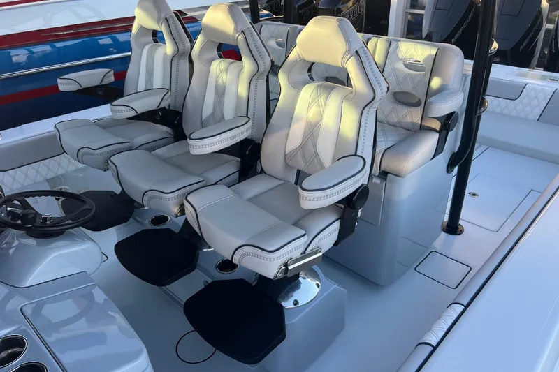 Slide: The Image of Luxury seating on 2026 Contender 39 ST boat, featuring modern design and comfort. - 19