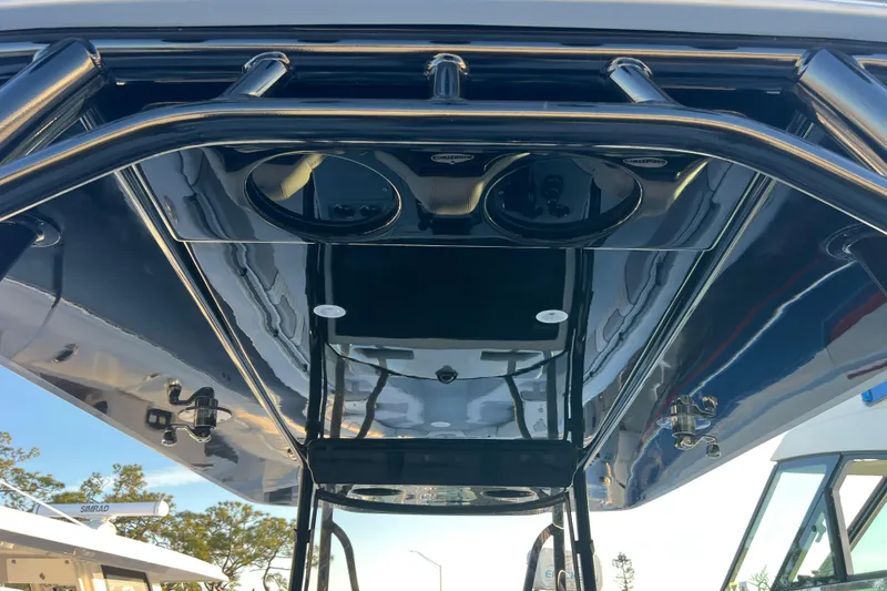 Slide: The Image of 2026 Contender 39 ST boat's sleek overhead view with sturdy framework and modern design. - 24