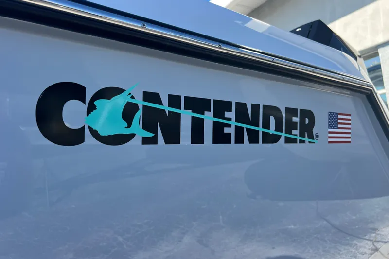 Slide: The Image of 2026 Contender 39 ST boat logo with American flag decal. - 6
