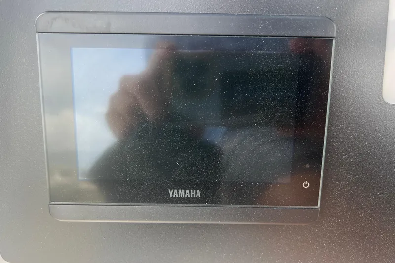 Slide: The Image of Yamaha display screen on 2025 Robalo 266 Cayman SD boat dashboard. - 37