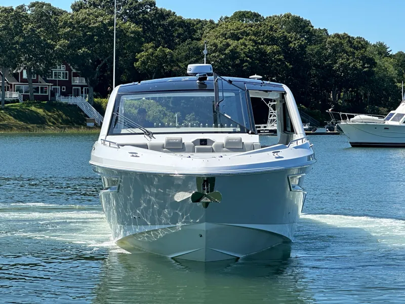 Slide: The Image of 2024 Cruisers Yachts 42 GLS Outboard on calm water. - 3