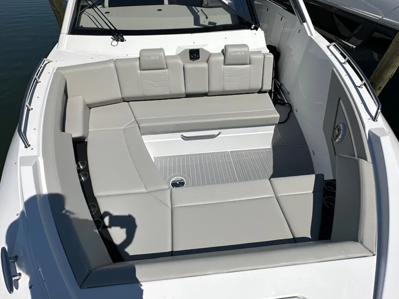 Slide: The Image of 2024 Cruisers Yachts 42 GLS Outboard, spacious seating area with modern design. - 32